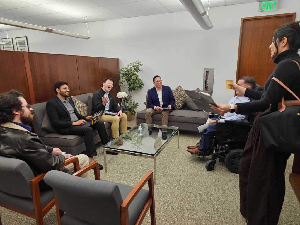 Smiling graduate students while talking